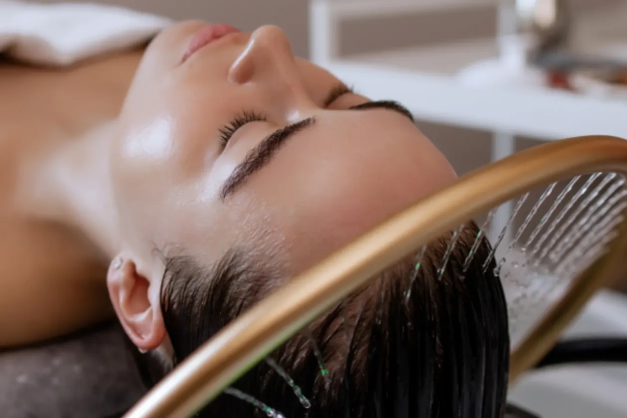 Close-up of a woman receiving a Japanese head massage